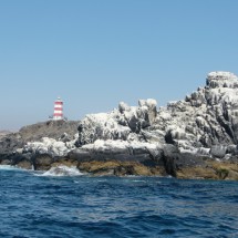 White rocks with the lighthouse of Caldera